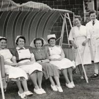 The nurses of Brotton Cottage Hospital trying out the new swing seat presented by the League Of Friends (1953)