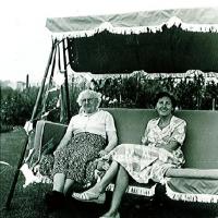 Neil Spreadburys grandmother and great grandmother on the family swing seat (1952)