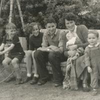 Stephen Hall on the far right, with his mother (Mrs. Nan Hall) who is holding his brother Andrew. The other three children being his cousins Dermot, Anna Mary and Ion Grove-White. Photo taken in 1953 at Ael-y-Don, Bull Bay, Anglesey. The swing seat (extra long) was made to special order for Stephens cousins father John Grove-White for his convalescence after he broke his leg in a motorbike accident
