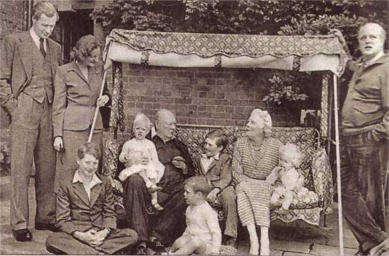 Winston Churchill on a swing seat - Chartwell